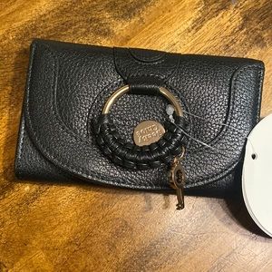 New cute wallet. Trendy hardware.